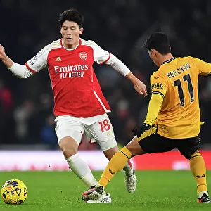 Arsenal vs. Wolverhampton Wanderers: Tomiyasu vs. Hwang Hee-Chan - A Premier League Battle at Emirates Stadium (2023-24)