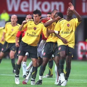 Arsenal wall (L>R) Cesc Fabregas, Alex Song and Justin Hoyte Arsenal wall (L>R) Cesc Fabregas, Alex Song and Justin Hoyte