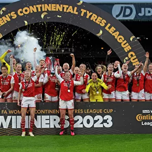 Arsenal Women Celebrate Conti Cup Triumph: Leah Williamson and Kim Little Lift the Trophy