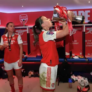 Arsenal Women Celebrate Conti Cup Victory: Katie McCabe Lifts the Trophy After Chelsea Victory