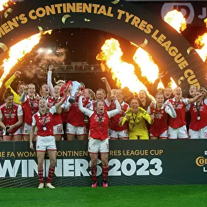 Arsenal Women Celebrate FA WSL Cup Victory: Leah Williamson and Kim Little Lift the Trophy (2023)