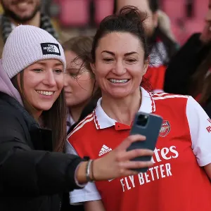 Arsenal Women Celebrate FA WSL Victory: Jodie Taylor Amidst Cheering Fans