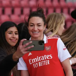 Arsenal Women Celebrate FA WSL Victory: Jodie Taylor Amidst Ecstatic Fans