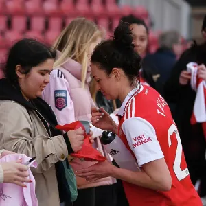 Arsenal Women Celebrate FA WSL Victory: Jodie Taylor Amidst Ecstatic Fans