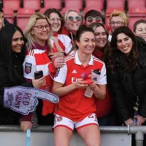 Arsenal Women Celebrate FA WSL Victory: Jodie Taylor Leads the Charge with Ecstatic Fans