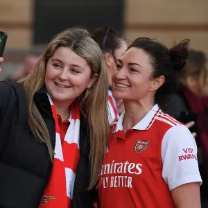 Arsenal Women Celebrate FA WSL Victory Over Tottenham Hotspur: Jodie Taylor Amidst Cheering Fans
