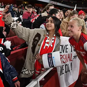 Arsenal Women Celebrate with Fans after Securing Victory over Tottenham Hotspur in FA WSL