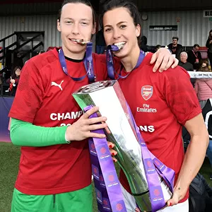 Arsenal Women Celebrate Historic WSL Title Win: Peyraud-Magnin and Schnaderbeck Hold the Trophy