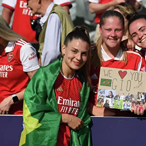 Arsenal Women Celebrate Title Win: Gio Queiroz and Fans at Meadow Park