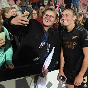 Arsenal Women Celebrate UEFA Champions League Qualification with Amsterdam Fans