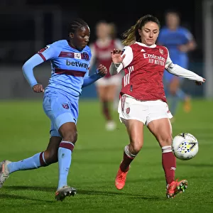 Arsenal Women vs. West Ham United Women: FA WSL Rivalry in Empty Meadow Park Amidst the Pandemic (April 2021)
