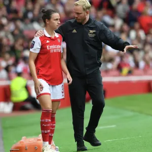 Arsenal Women's Coach Jonas Eidevall Guides Lotte Wubben-Moy at Emirates Stadium (2022-23 FA WSL): Arsenal vs. Tottenham Arsenal Women's Coach Jonas Eidevall Guides Lotte Wubben-Moy at Emirates Stadium (2022-23 FA WSL): Arsenal vs. Tottenham