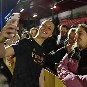Arsenal Women's Player Lotte Wubben-Moy Interacts with Fan after Brighton Match