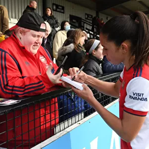 Arsenal Women's Rafaelle Celebrates Victory over Manchester United with Autograph Signing Session