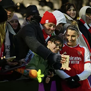 Arsenal Women's Super League Triumph: Steph Catley Celebrates with Adoring Fans