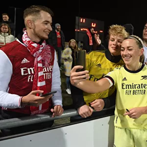 Arsenal Women's Team Celebrates UEFA Champions League Victory with Fans