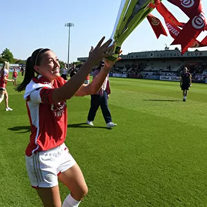 Arsenal Women's Victory: Katie McCabe Lifts the Conti Cup Trophy