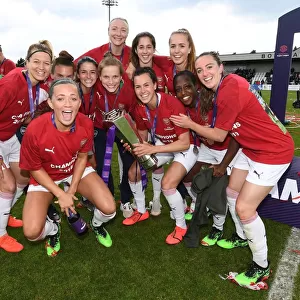 Arsenal Women's Victory: A Triumphant Team Moment with Janni Arnth, Katrine Veje, Katie McCabe, Jordan Nobbs, Louise Quinn, Ava Kuyken, Viki Schnaderbeck, Lia Walti, and Lisa Evans