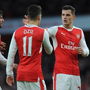 Arsenal: Xhaka and Ozil Celebrate Teamwork during Arsenal v AFC Bournemouth Match, 2016/17