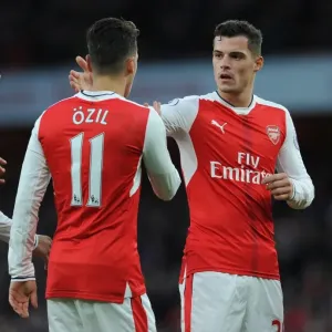 Arsenal: Xhaka and Ozil Celebrate Teamwork during Arsenal v AFC Bournemouth Match, 2016/17