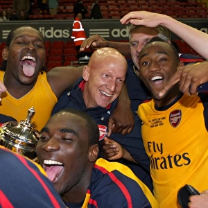 Arsenal Youth Physio Jon Cooke celebrates with the team