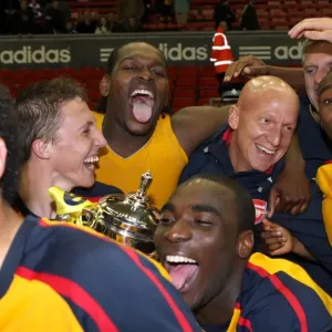 Arsenal Youth Physio Jon Cooke celebrates with the team in Print Arsenal Youth Physio Jon Cooke celebrates with the team in Print