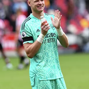 Arsenal's Aaron Ramsdale Celebrates with Fans after Brentford Victory