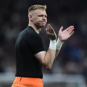 Arsenal's Aaron Ramsdale Celebrates with Fans after Tottenham Clash in 2021-22 Premier League Arsenal's Aaron Ramsdale Celebrates with Fans after Tottenham Clash in 2021-22 Premier League