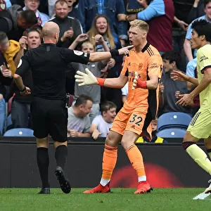 Arsenal's Aaron Ramsdale Pleads Innocence to Referee during Burnley vs Arsenal Clash (Premier League 2021-22)