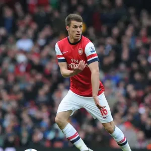 Arsenal's Aaron Ramsey in Action: Arsenal vs. Norwich City (2012-13) Arsenal's Aaron Ramsey in Action: Arsenal vs. Norwich City (2012-13)