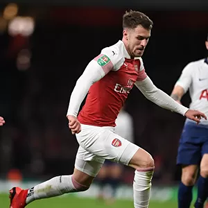 Arsenal's Aaron Ramsey in Action: Battle against Tottenham in Carabao Cup