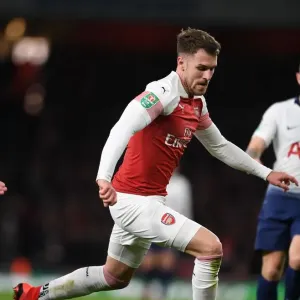 Arsenal's Aaron Ramsey in Action: Battle against Tottenham in Carabao Cup Arsenal's Aaron Ramsey in Action: Battle against Tottenham in Carabao Cup