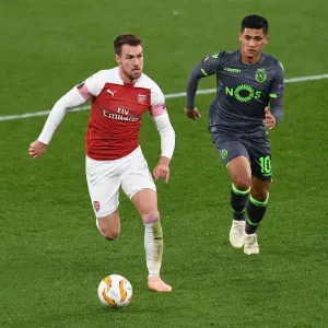 Arsenal's Aaron Ramsey Clashes with Sporting CP's Fredy Montero in Europa League Showdown Arsenal's Aaron Ramsey Clashes with Sporting CP's Fredy Montero in Europa League Showdown