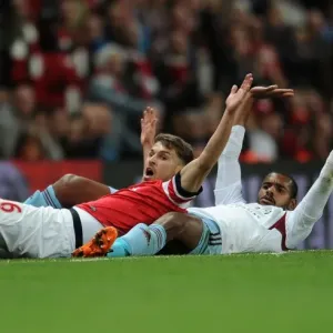 Arsenal's Aaron Ramsey Clashes with West Ham's Ricardo Vaz Te in Intense Premier League Match Arsenal's Aaron Ramsey Clashes with West Ham's Ricardo Vaz Te in Intense Premier League Match