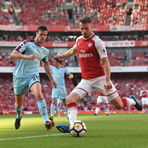 Arsenal's Aaron Ramsey Faces Off Against Burnley's Kevin Long in Intense Premier League Clash
