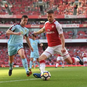 Arsenal's Aaron Ramsey Faces Off Against Burnley's Kevin Long in Intense Premier League Clash Arsenal's Aaron Ramsey Faces Off Against Burnley's Kevin Long in Intense Premier League Clash