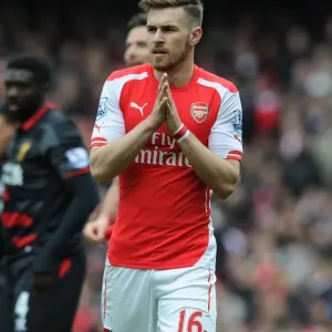 Arsenal's Aaron Ramsey Faces Off Against Liverpool in the Premier League 2014-15