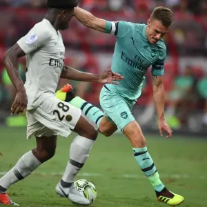 Arsenal's Aaron Ramsey Faces Off Against PSG's Loic Mbe Soh in 2018 International Champions Cup Arsenal's Aaron Ramsey Faces Off Against PSG's Loic Mbe Soh in 2018 International Champions Cup
