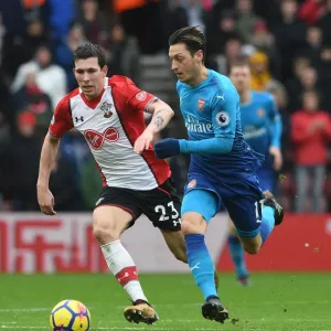 Arsenal's Aaron Ramsey Faces Off Against Southampton's Pierre-Emile Hojbjerg in Premier League Clash