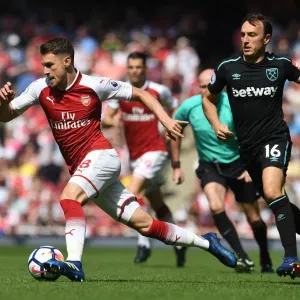 Arsenal's Aaron Ramsey Faces Off Against West Ham's Mark Noble in Premier League Clash Arsenal's Aaron Ramsey Faces Off Against West Ham's Mark Noble in Premier League Clash
