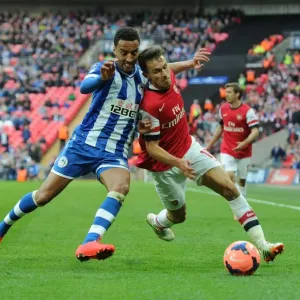 Arsenal's Aaron Ramsey Faces Off Against Wigan's James Perch in FA Cup Semi-Final Showdown Arsenal's Aaron Ramsey Faces Off Against Wigan's James Perch in FA Cup Semi-Final Showdown