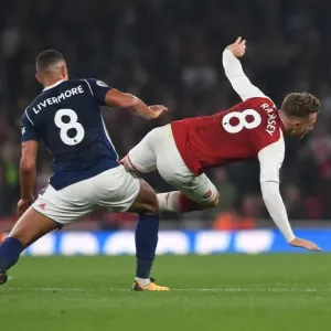 Arsenal's Aaron Ramsey Fouled by Jake Livermore in 2017-18 Premier League Clash Arsenal's Aaron Ramsey Fouled by Jake Livermore in 2017-18 Premier League Clash