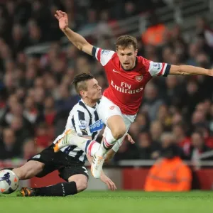 Arsenal's Aaron Ramsey Fouls by Newcastle's Mathieu Debuchy: Intense Moment from the 2013/14 Premier League Match Arsenal's Aaron Ramsey Fouls by Newcastle's Mathieu Debuchy: Intense Moment from the 2013/14 Premier League Match