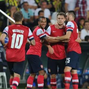 Arsenal's Aaron Ramsey, Jack Wilshere, Theo Walcott and Carl Jenkinson Celebrate Goals Against Fenerbahce in UEFA Champions League Play-offs