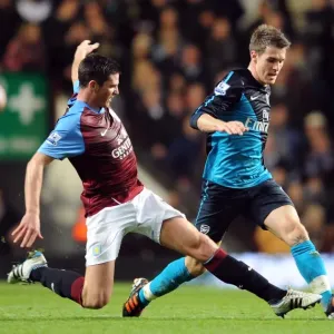 Arsenal's Aaron Ramsey Outmuscles Aston Villa's Ciaran Clark in Premier League Clash