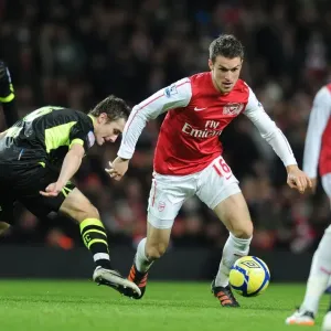 Arsenal's Aaron Ramsey Scores Past Leeds Danny Pugh in FA Cup Third Round Clash