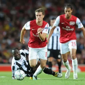 Arsenal's Aaron Ramsey Scores Past Udinese's Pablo Armero in 2011-12 UEFA Champions League Play-Off