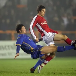 Arsenal's Aaron Ramsey Scores Twice Against Portsmouth's Callum Reynolds in Reserves Clash Arsenal's Aaron Ramsey Scores Twice Against Portsmouth's Callum Reynolds in Reserves Clash