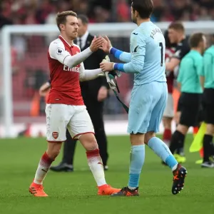 Arsenal's Aaron Ramsey and Swansea's Lukasz Fabianski Share a Moment After Match Arsenal's Aaron Ramsey and Swansea's Lukasz Fabianski Share a Moment After Match