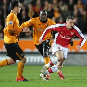 Arsenal's Abou Diaby and Jan Vennegoor of Hesselink Secure Victory Over Hull's Kamil Zayette: 2-1 Barclays Premier League Clash Arsenal's Abou Diaby and Jan Vennegoor of Hesselink Secure Victory Over Hull's Kamil Zayette: 2-1 Barclays Premier League Clash